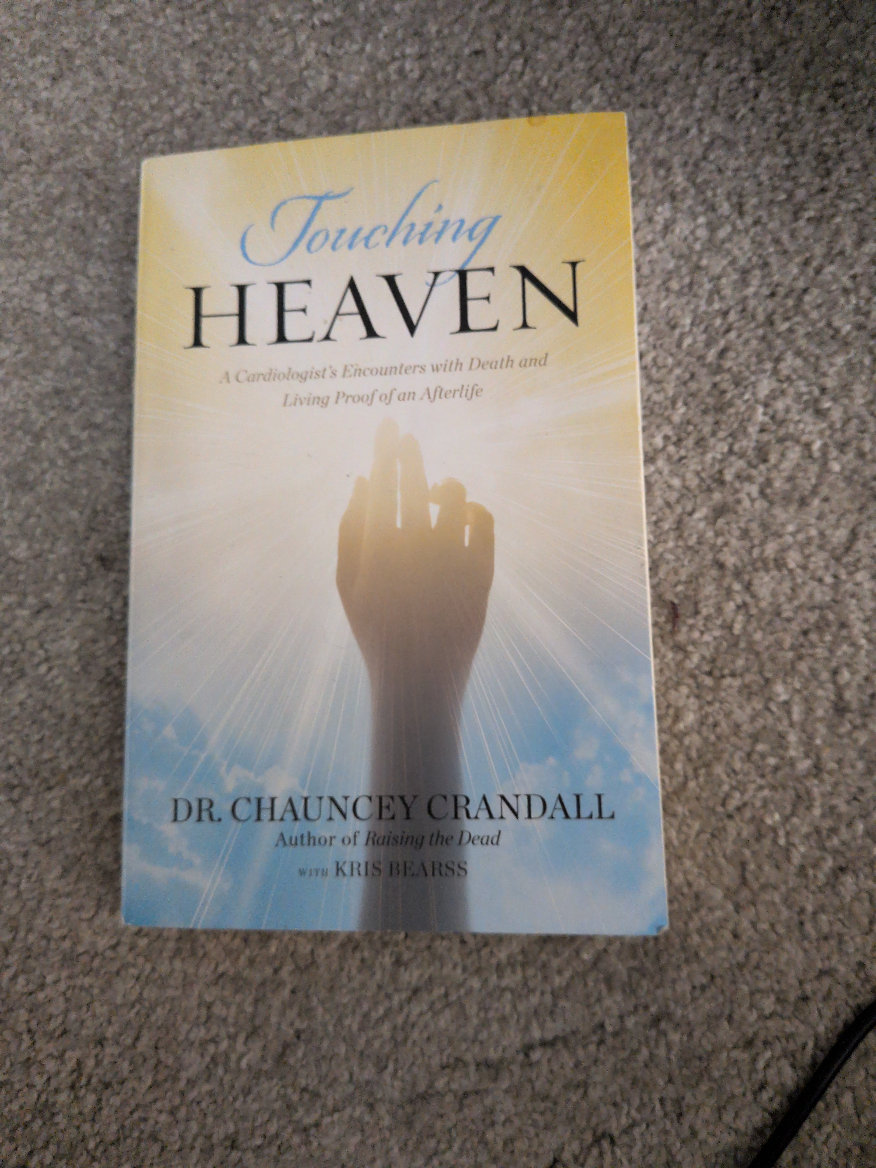 Touching Heaven A cardiologist's encounter with Death and Living Proof of an After-Life By Dr. Chauncey Crandall